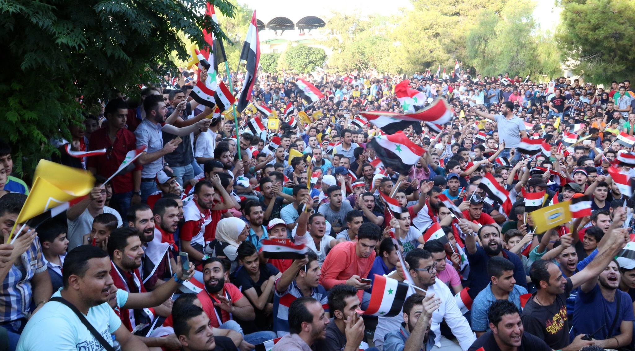 Syrians celebrating World Cup qualifying match